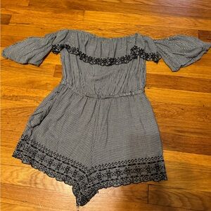 Black and white checkered romper with puff sleeve
